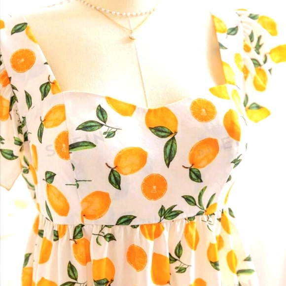 Lemon Mini Dress - Picture 2 of 8